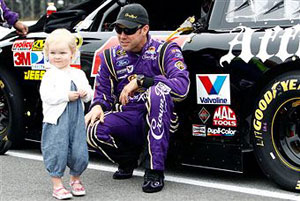 Matt Kenseth, driver of the #17 Affliction Clothing: Live Fast Ford, stands at his car with his daughter Kaylin Nicola during the NASCAR Sprint Cup Series 5-Hour Energy 500 at Pocono Raceway on June 12, 2011 in Long Pond, Pennsylvania. (Photo by Jeff Zelevansky/Getty Images for NASCAR) 