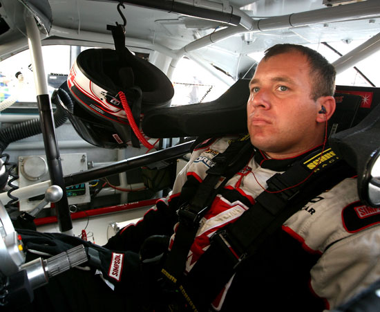 Ryan Newman, driver of the No. 39 Haas Automation Chevrolet, sits in his car in the garage during practice for the NASCAR Sprint Cup Series 5-Hour Energy 500 at Pocono Raceway on June 10 in Long Pond, Pa. (Credit: Jerry Markland/Getty Images)