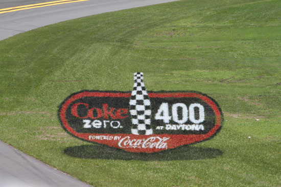 The innovative 3D turf logo on the grass apron inside Turn 4 at Daytona International Speedway makes its debut at the NASCAR Sprint Cup Series Coke Zero 400 Weekend Powered By Coca-Cola. (Credit: ISC Images and Archives)