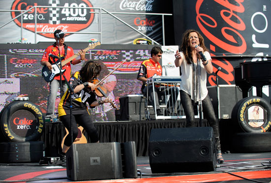 Country Music Superstar Martina McBride performs for fans prior to the NASCAR Sprint Cup Series Coke ZERO 400 Powered by Coca-Cola at Daytona International Speedway on July 2, 2011 in Daytona Beach, Florida. (Photo by Jared C. Tilton/Getty Images)