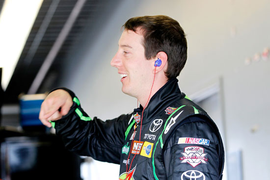 Kyle Busch laughs in the NASCAR Nationwide Series garage as he prepared to turn practice laps Thursday at Daytona International Speedway. (Credit: Geoff Burke, Getty Images for NASCAR)