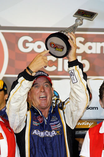 Ron Hornaday, driver of the No. 33 Armour/Ingles Chevrolet, celebrates after winning the NASCAR Camping World Truck Series Good Sam Club 200 at Atlanta Motor Speedway on Sept. 2 in Hampton, Ga. (Credit: Chris Graythen/Getty Images)