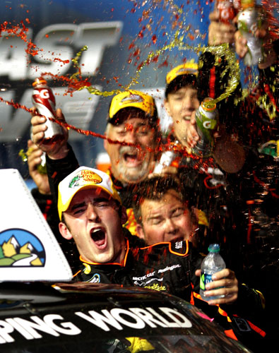 Austin Dillon, driver of the No. 3 Bass Pro Shops/Tracker Chevrolet, celebrates in Victory Lane after winning the NASCAR Camping World Truck Series Fast Five 225 at Chicagoland Speedway on Sept. 16 in Joliet, Ill. (Credit: Jerry Markland/Getty Images for NASCAR)