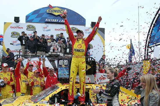 Kurt Busch celebrates in Sunoco Victory Lane on Sunday at Dover International Speedway in Dover, Del. after winning the third Chase for the NASCAR Sprint Cup race of the 2011 season. (Credit: Tom Whitmore/Getty Images for NASCAR)