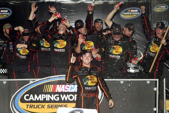 Austin Dillon celebrates his first NASCAR Camping World Truck Series championship with his Richard Childress Racing team at Homestead-Miami Speedway. (Credit: By Jerry Markland, Getty Images for NASCAR)
