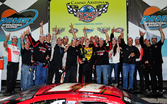 Ryan Blaney celebrates with his team in Phoenix Victory Lane. (Credit: Rainier Ehrhardt/Getty Images for NASCAR)