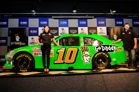 Danica Patrick unveils her No. 10 GoDaddy.com Chevrolet for the 2012 season with team owner Tony Stewart following practice for the NASCAR Sprint Cup AAA Texas 500 at Texas Motor Speedway on Nov. 4 in Fort Worth, Texas. (Credit: John Harrelson/Getty Images for NASCAR)