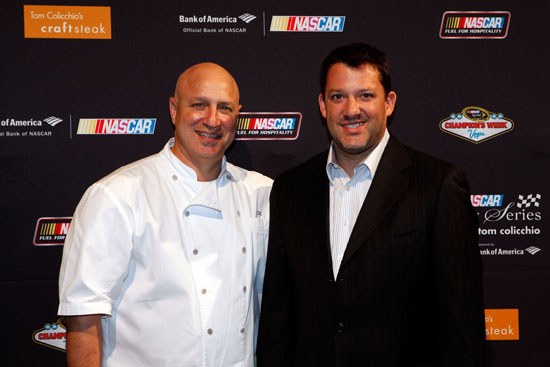 NASCAR Sprint Cup Series champion Tony Stewart, right, and Chef Tom Colicchio attend the NASCAR Evening Series during the NASCAR Sprint Cup Series Champion's Week at Tom Colicchio's Craftsteak inside the MGM Grand Hotel/Casino on Nov. 30, 2011, in Las Vegas, Nev. (Credit: Chris Graythen/Getty Images for NASCAR)