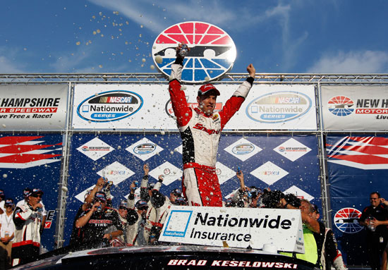 Brad Keselowski celebrates winning the F.W. Webb 200 at New Hampshire Motor Speedway. (Credit: Tom Pennington/Getty Images for NASCAR)